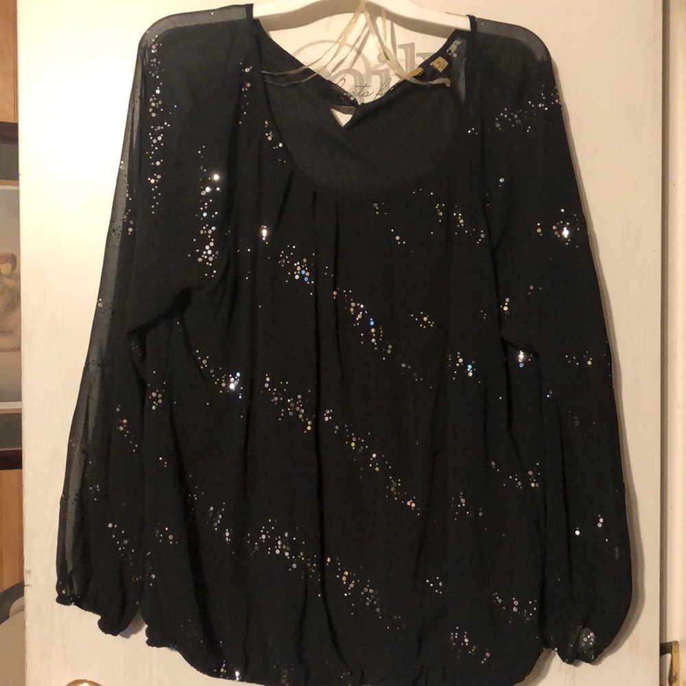 Blouse with see thru sleeves